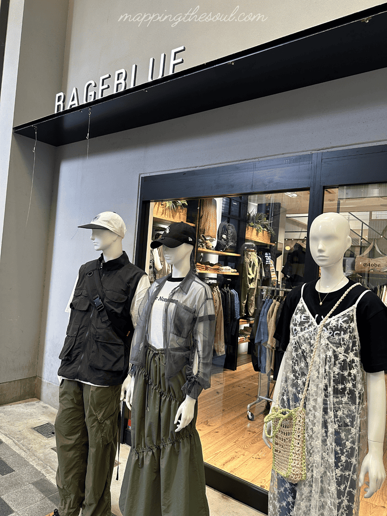 Rageblue, the sign spells out the clothing brand's name at the top left.