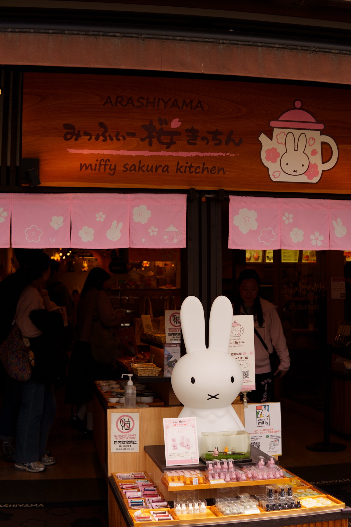 Miffy Sakura Kitchen in Arashiyama, Kyoto. There is a large Miffy on display, and the sign has a Miffy teapot with the words "Arashiyama Miffy Sakura Kitchen"