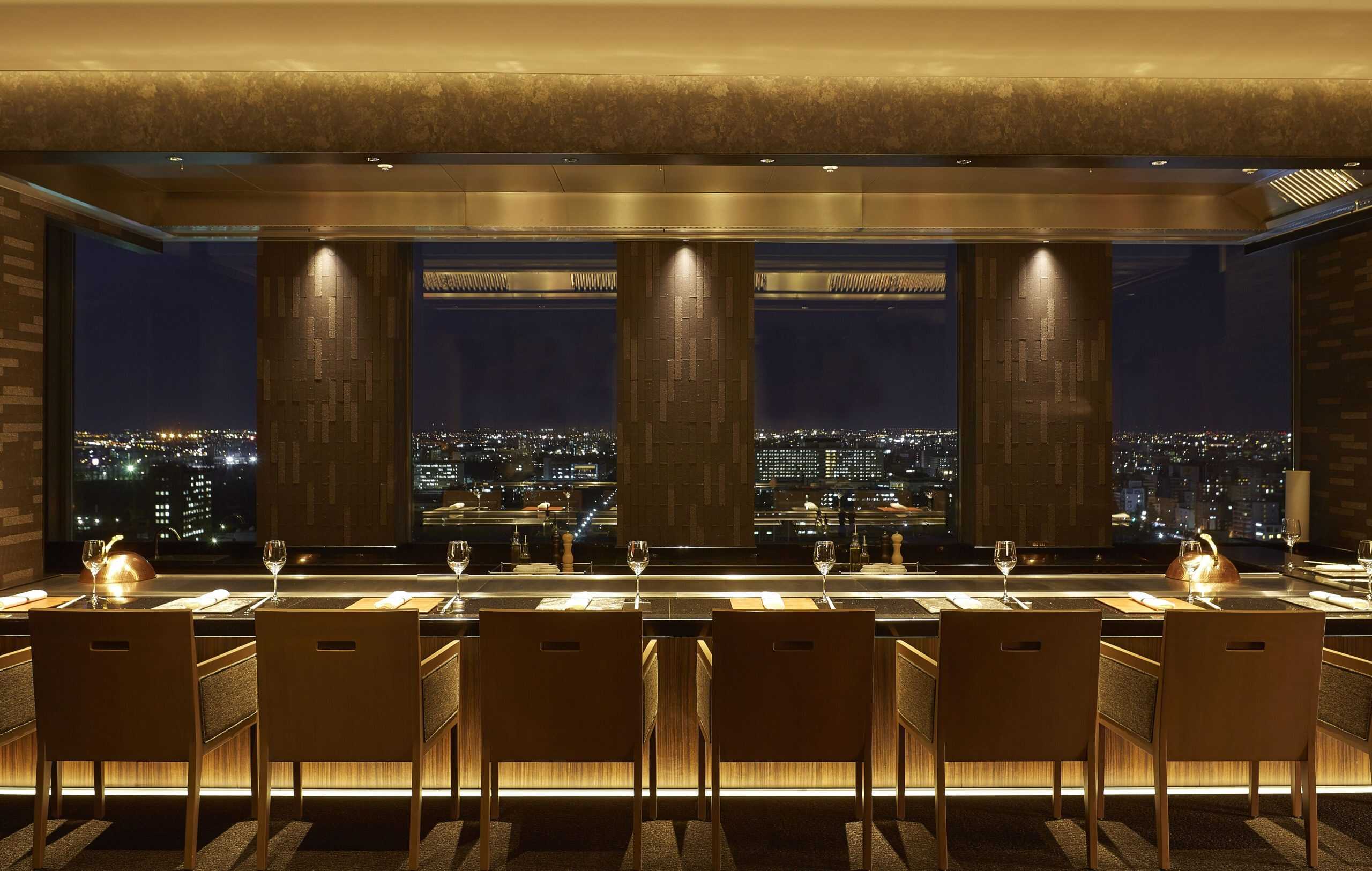 Fine dining at Keio Plaza Hotel's skyline restaurant, where you can enjoy gourmet cuisine with sweeping nighttime views — an upscale experience typical of 5 star hotels in Sapporo.