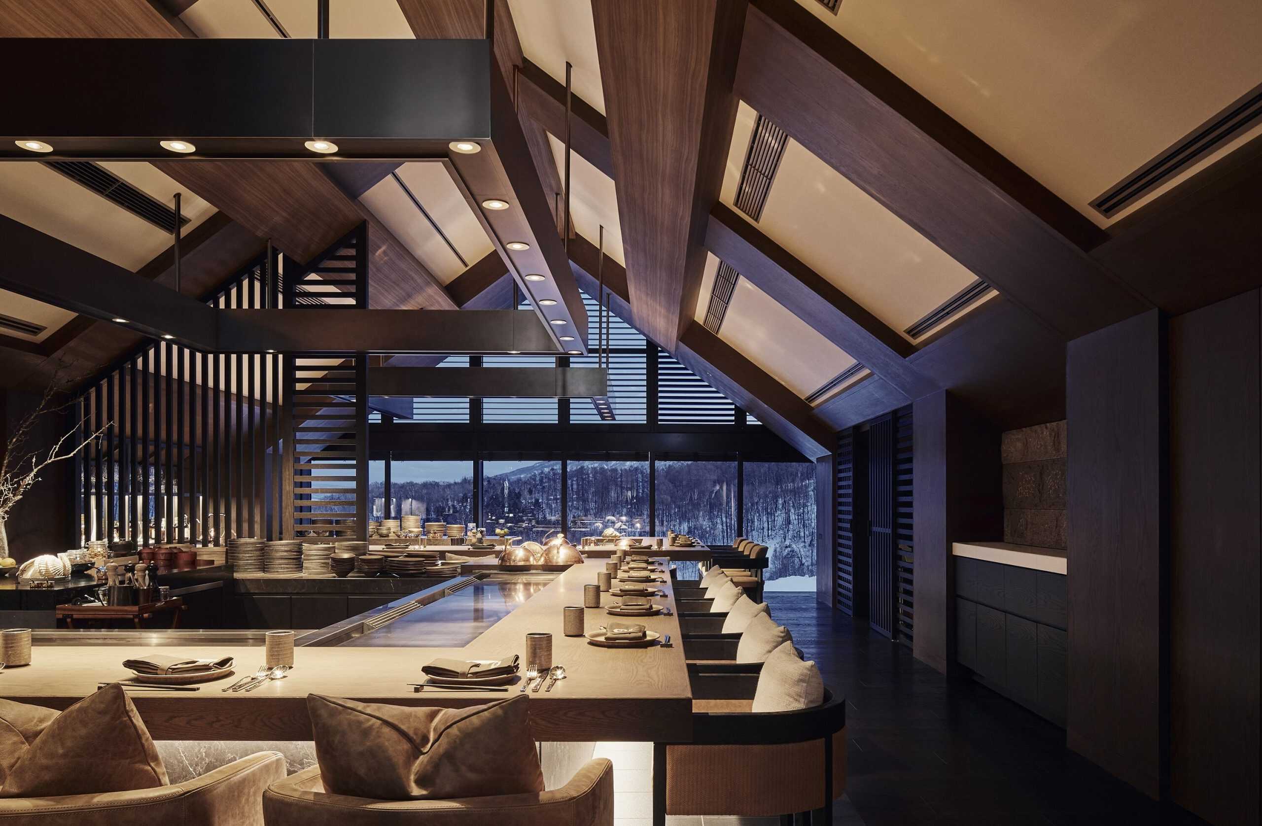 Elegant teppanyaki restaurant with mountain views and a refined atmosphere, highlighting the elevated culinary experience at Park Hyatt Niseko Hanazono, one of the premier 5 star hotels in Sapporo and Hokkaido.