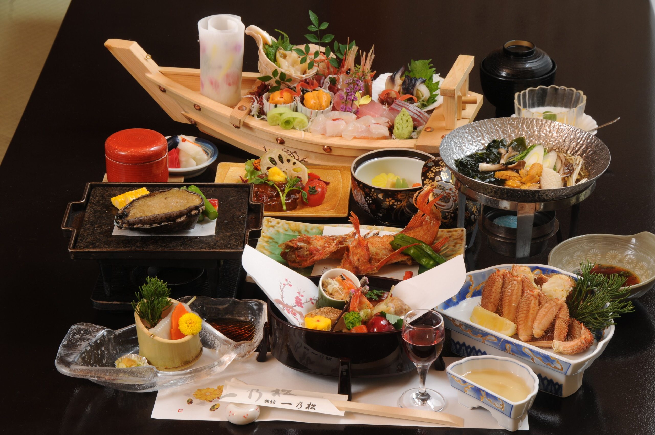 Traditional kaiseki dinner at Ryokan Ichinomatsu, a top-rated Hakodate ryokan known for its exquisite seasonal cuisine.