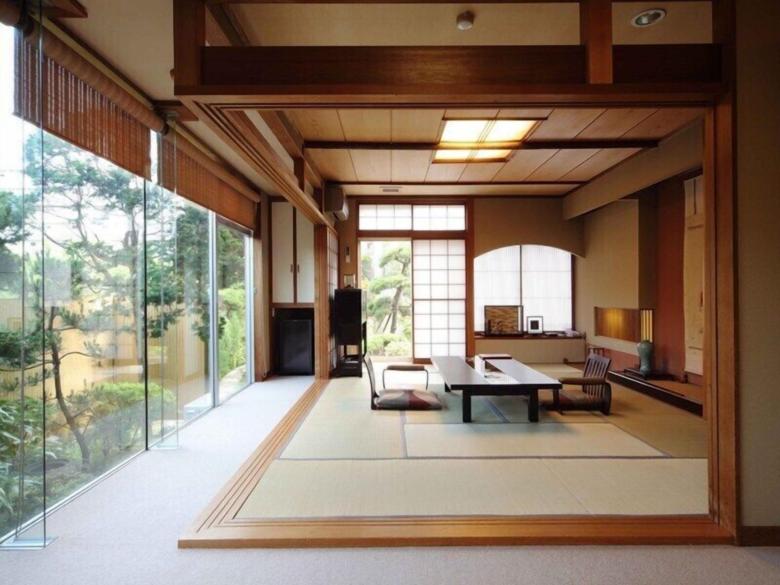 Spacious tatami-style guest room at Ryokan Ichinomatsu, a Hakodate ryokan blending traditional design with garden views.