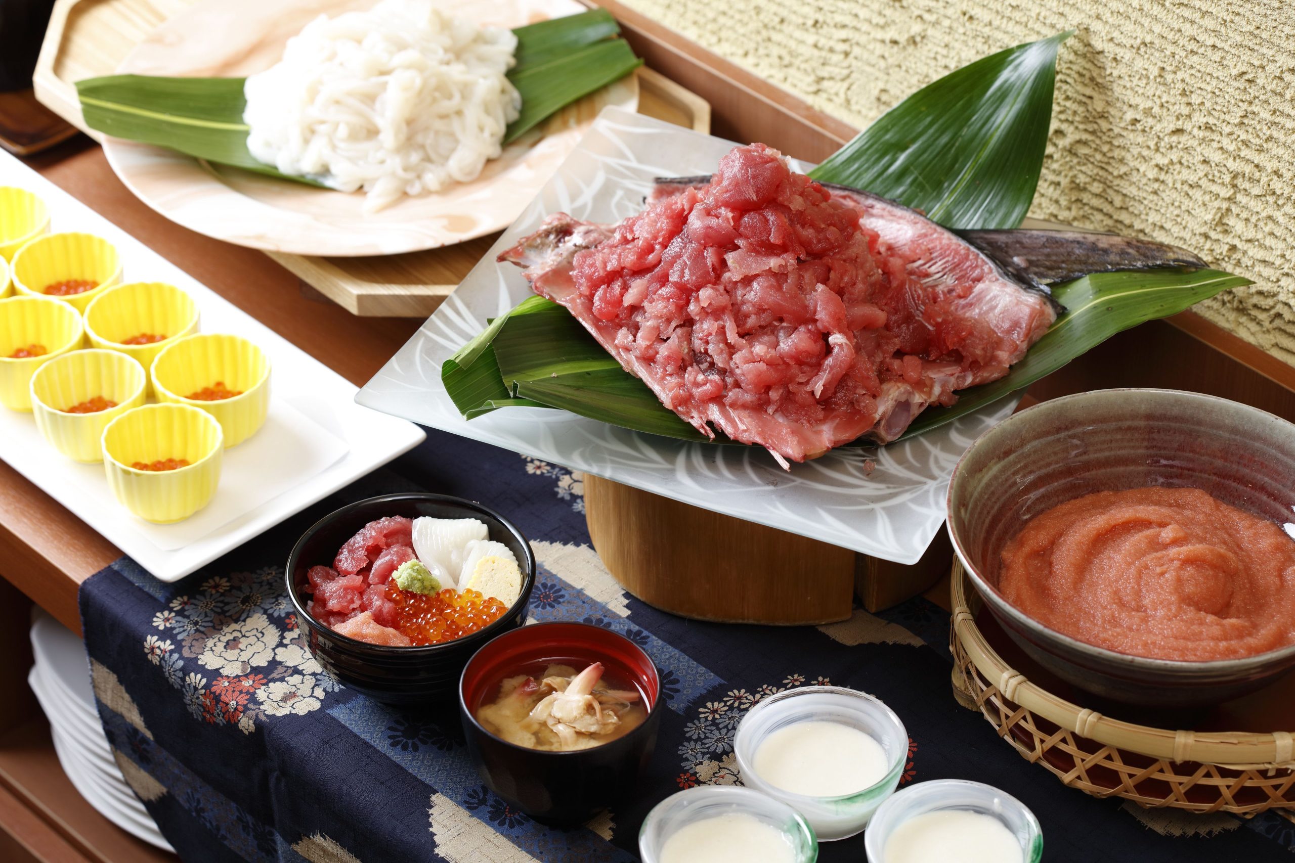 Fresh seafood dinner at Emi Hakodateya including sashimi, ikura, and miso soup