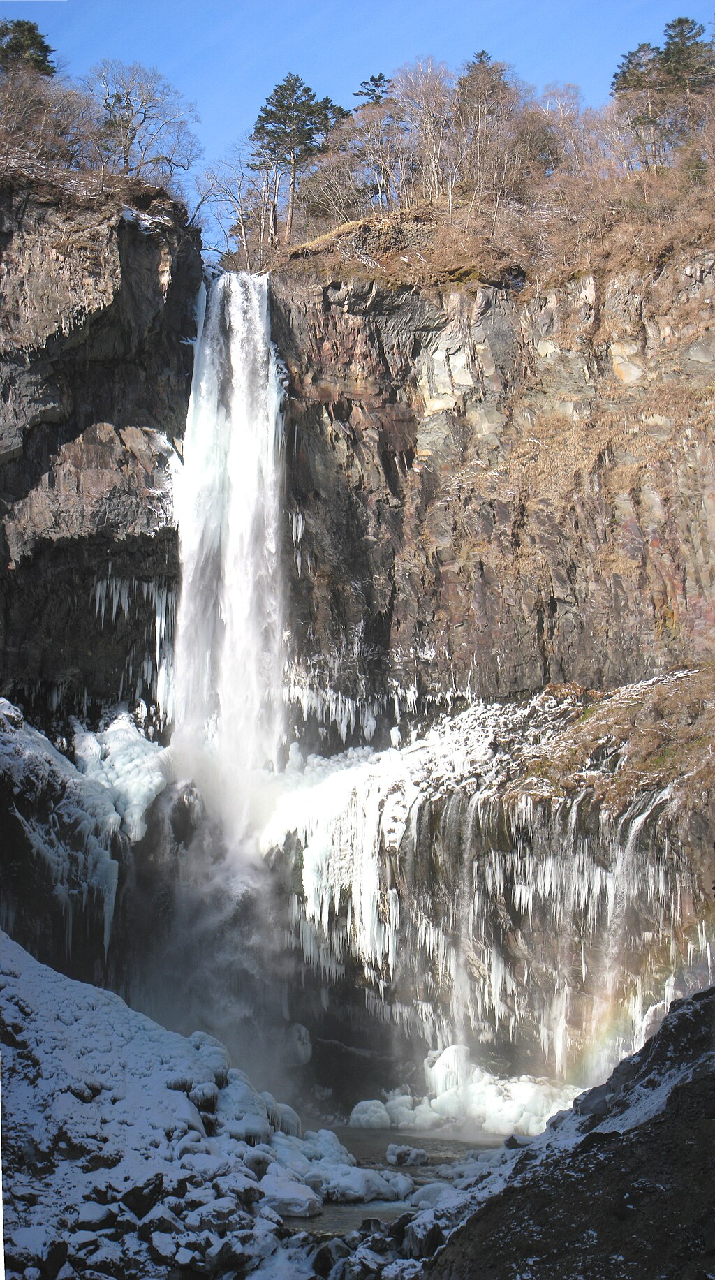 Frozen Kegon Falls in Nikko National Park during winter, a stunning icy waterfall often visited on day trips from Tokyo in winter.