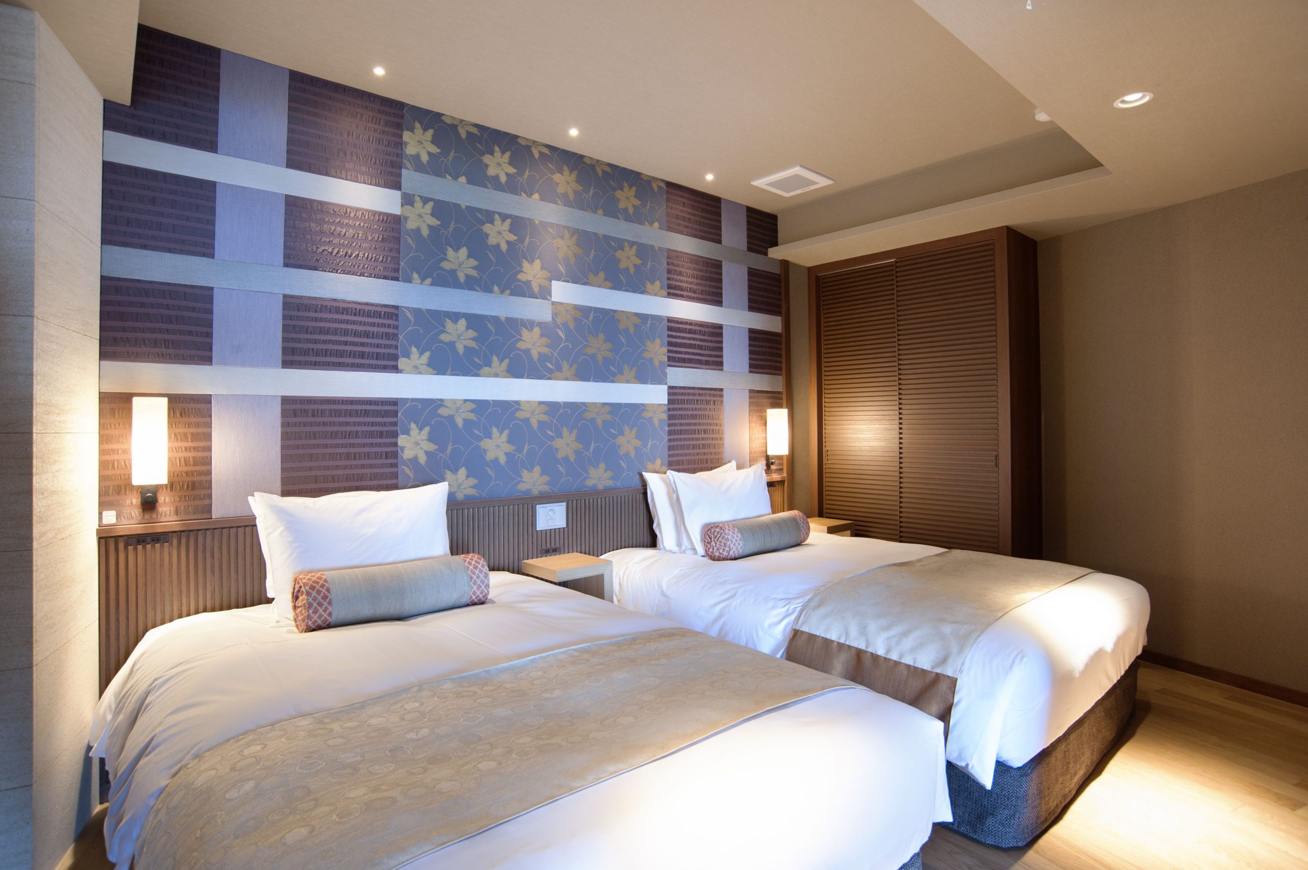 Modern guest room at Atami SEKAIE, a luxury Atami onsen hotel with ocean views and contemporary Japanese design.