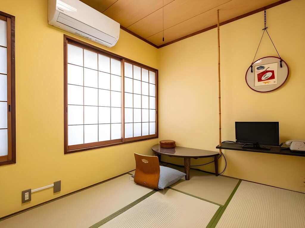 Traditional tatami-style room at Zuiho-so, a classic Atami ryokan offering authentic Japanese hospitality.