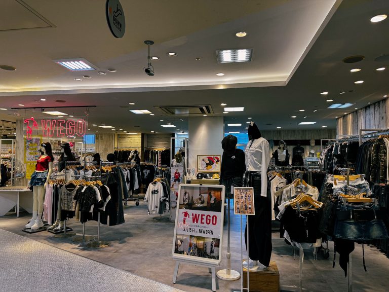 Interior of WEGO clothing store inside AEON Mall Sapporo, showcasing trendy streetwear, mannequins, and racks of casual fashion.