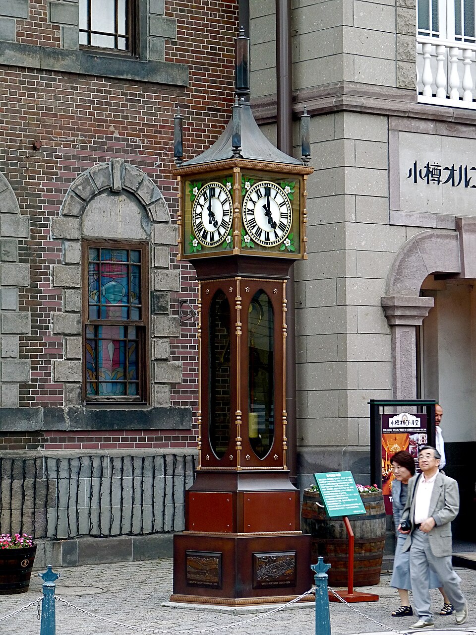 The Otaru Steam Clock standing outside brick buildings near Sakaimachi Street, gently steaming as it marks time in this nostalgic port city.