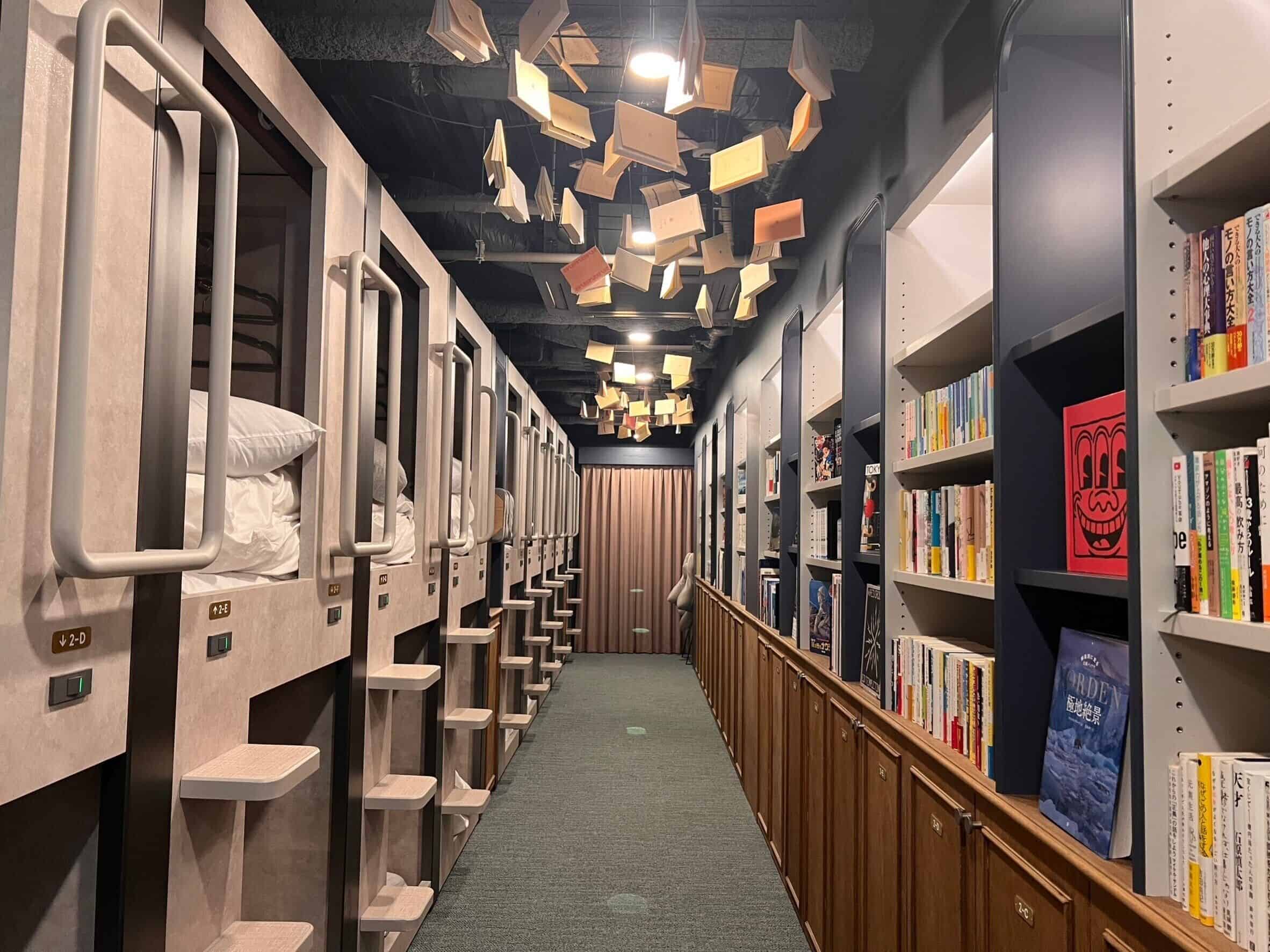Creative capsule-style library hostel at BookTeaBed Tokyo Shibuya, a cozy option for those wondering shibuya where to stay on a budget.