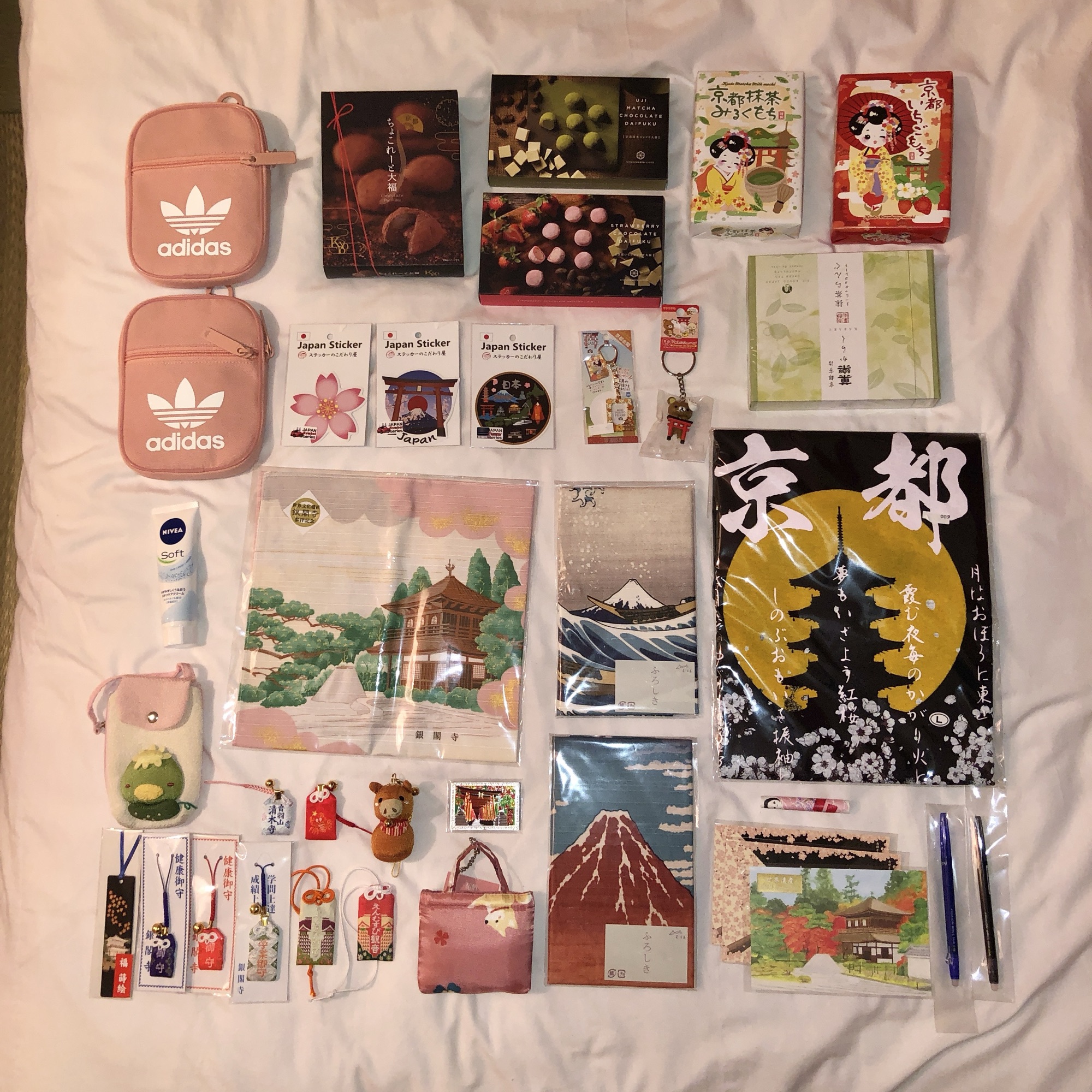 Japan souvenirs, snacks, charms, and stationery collected from a japan trip vacation
